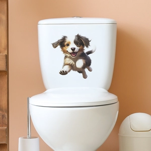 Makroansicht eines 3D-Hundestickers mit Australian Shepherd Motiv auf dem Spülkasten