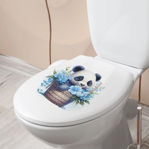 Detail of cute panda in a blue flower basket sticker applied on a white toilet lid