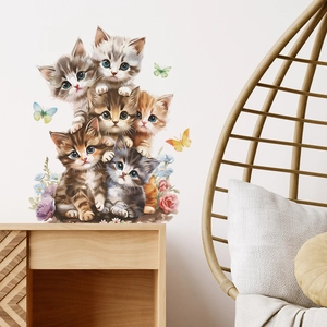 Detail of cute cartoon stacked cats wall sticker with colorful butterflies for nursery decor