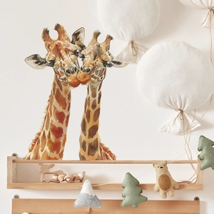 Watercolor kissing giraffes wall stickers for nursery decor in warm orange and brown tones