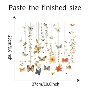 Detail showing dimensions of butterfly and flower wall stickers at 27cm by 25cm