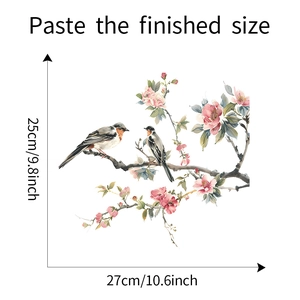 Detail showing the plum blossom bird wall sticker with 25cm by 27cm size dimensions