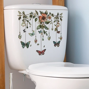 Vintage floral toilet tank sticker with green leaves and colorful butterflies on ceramic