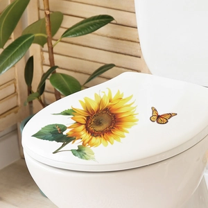 Waterproof sunflower and butterfly wall sticker set applied on a white toilet lid