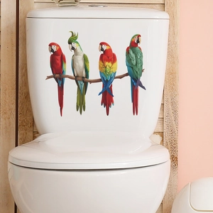 Colorful parrot bird family wall stickers on a white toilet tank in a bathroom setting