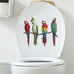 Waterproof PVC toilet lid sticker featuring four colorful cartoon parrots on a branch