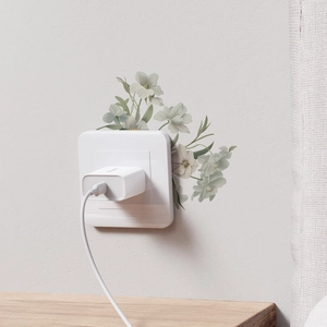 Elegant white magnolia wall sticker for light switch decor with green leaves