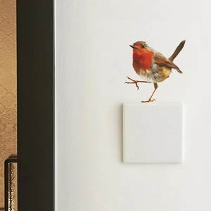 Realistic robin bird wall sticker for light switch decoration in a cozy bedroom