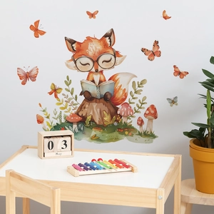 Detail of watercolor fox reading a book wall decal in a cozy children playroom setting