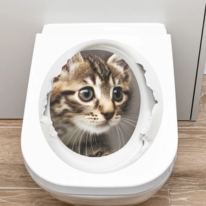 Close-up of 3D cat wall sticker with lifelike brown tabby kitten and hole effect