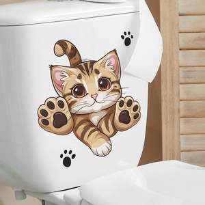 Simpatico adesivo per WC a forma di gatto marrone con impronte di zampe su ceramica