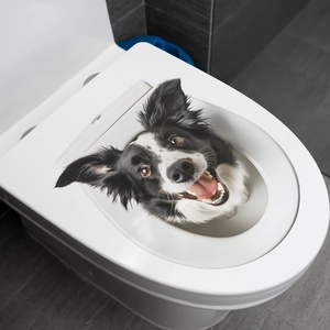 Close-up of 3D Border Collie toilet lid sticker showing realistic peering puppy design