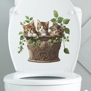 Detail of cute cats in flower pots with green vines stickers on a white toilet lid