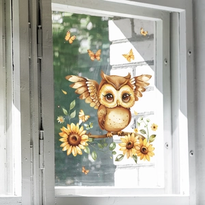 Detail of static cling window sticker featuring owl, sunflowers, and butterflies on glass