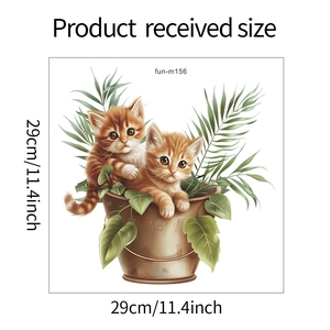 Close-up of cute cartoon orange cats with green leaves wall sticker measuring 29cm x 29cm