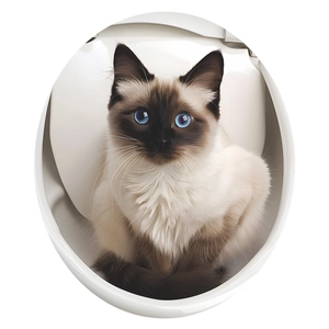 Detail view of 3D Siamese cat toilet lid sticker with realistic blue eyes and fur