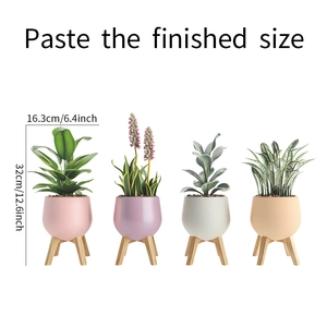 Detail of four potted plant wall stickers with dimensions 16.3cm width and 32cm height