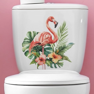 Détail de stickers flamant rose et feuilles tropicales sur réservoir de WC en céramique