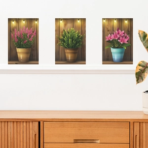 Three-piece wall stickers set featuring potted plants and flowers with fairy lights decor