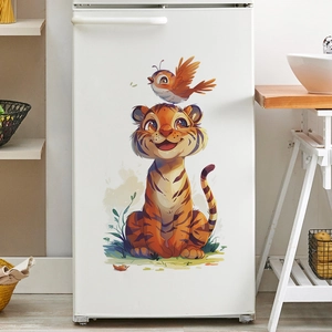 Detailed close-up of a cartoon tiger and bird wall sticker applied on a white refrigerator