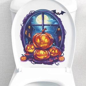 Sticker citrouille d'Halloween sur abattant WC avec maison hantée et chauves-souris