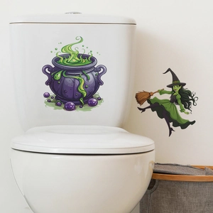 Detail of Halloween toilet stickers featuring a purple cauldron and flying witch graphics