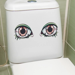 Spooky green eye decals for Halloween toilet decor on a white background tank