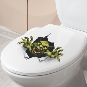 Detailed 3D effect green monster sticker appearing to burst through a white toilet lid
