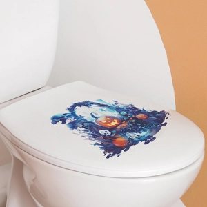 Vue détaillée de l'autocollant citrouille et crâne d'Halloween sur abattant WC