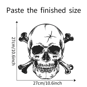 Detail view of monochrome skull and crossbones sticker showing dimensions of 27cm x 27cm