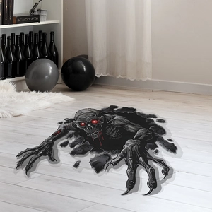 Detailed view of 3D Halloween monster floor sticker with red eyes crawling out of cracks