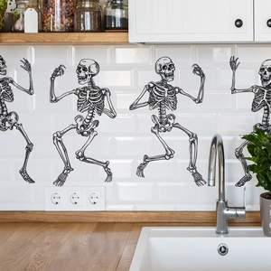 Detail of waterproof dancing skeletons wall stickers on modern white kitchen tiles