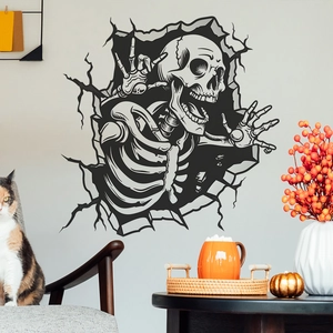 3D Halloween wall sticker featuring a skeleton emerging from a cracked wall in a living room