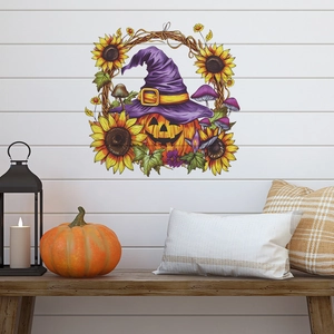 Detail of Halloween pumpkin wall sticker with sunflowers and wizard hat on wood wall