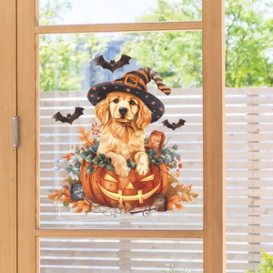 Detail of Halloween window sticker featuring a golden retriever puppy in a pumpkin with bats