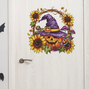 Halloween pumpkin sticker with witch hat and sunflowers on a light wood grain door