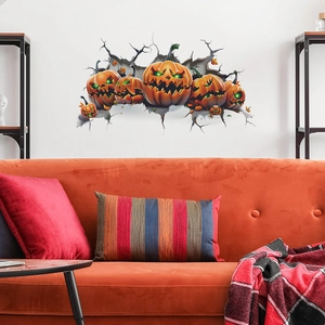 3D Halloween wall decal featuring spooky pumpkins breaking through a white living room wall