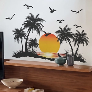 Close-up of tropical sunset wall stickers with palm trees and seagulls on white wall