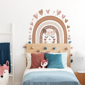 Nursery wall decals featuring Morandi rainbow, cute alpaca and hearts in a cozy kids bedroom