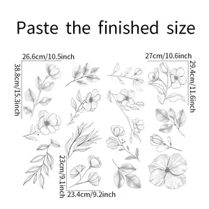 Detailed size guide for black and white floral wall decals with metric and inch measurements