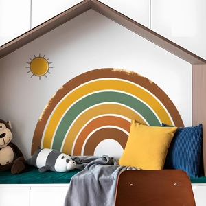 Detail view of a large boho rainbow wall sticker set in a modern nursery room setting