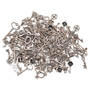 Detailed macro view of assorted antique bronze mixed metal keys for DIY jewelry making