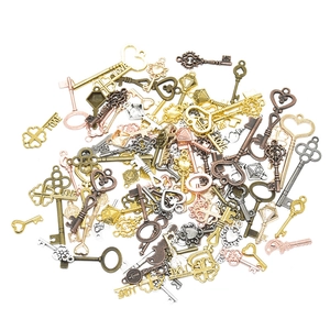 Mixed vintage alloy key charms in bronze, gold, and silver finishes for DIY jewelry