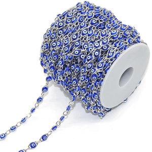 Macro view of blue evil eye chain bulk roll for DIY necklace jewelry making