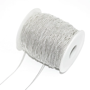 Silver bead chain for DIY jewelry making wound on a white plastic spool