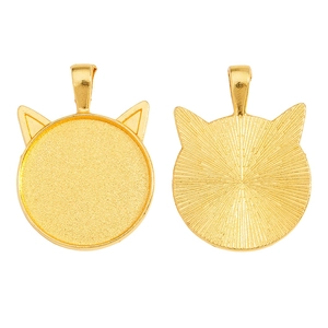 Detail showing front and back of golden cat ear pendant tray for DIY jewelry making