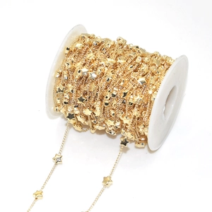 Golden metal star chain on spool for DIY jewelry making and handmade accessories