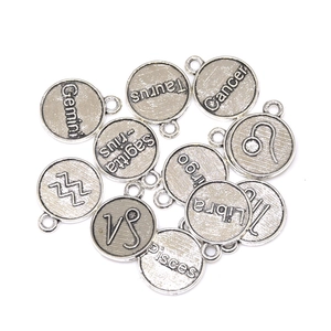 Silver-color vintage zodiac pendants with engraved symbols for DIY jewelry making