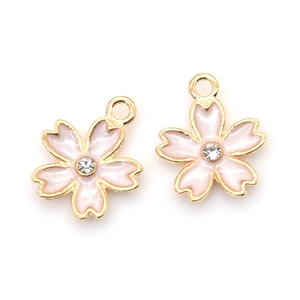 Pink enamel cherry blossom pendant charms with gold edges and central crystal stone
