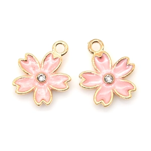 Detail of pink cherry blossom pendants with gold edges and small inset rhinestones